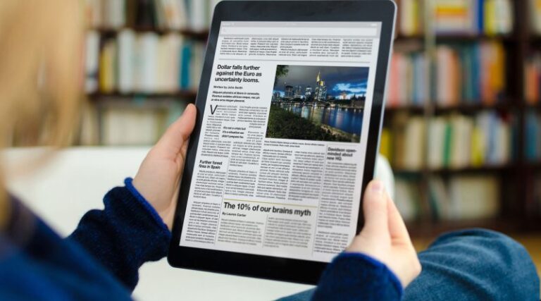 person-reading-news-on-tablet.original-800x445